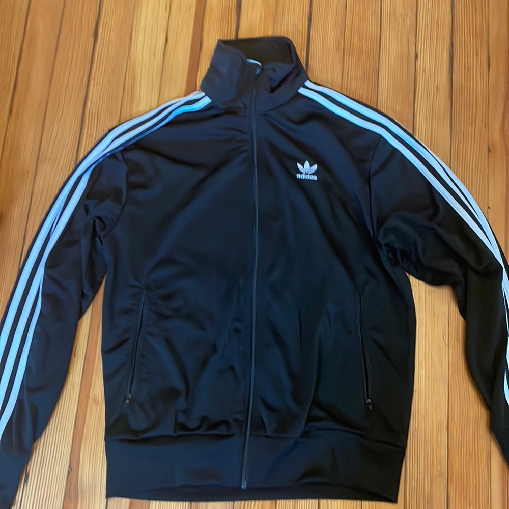 Classic Adidas three stripe zip-up.
